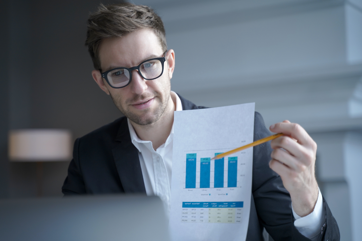 austrian-ceo-male-in-suit-sitting-in-front-of-lapt-2022-08-23-19-33-38-utc